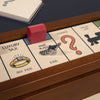 A close-up of the 3-in-1 Game Collection: Monopoly, Sorry & Mancala board features Park Place, Chance, and Luxury Tax spaces with a red hotel and shoe token on Park Place—an ideal addition to any game cabinet.