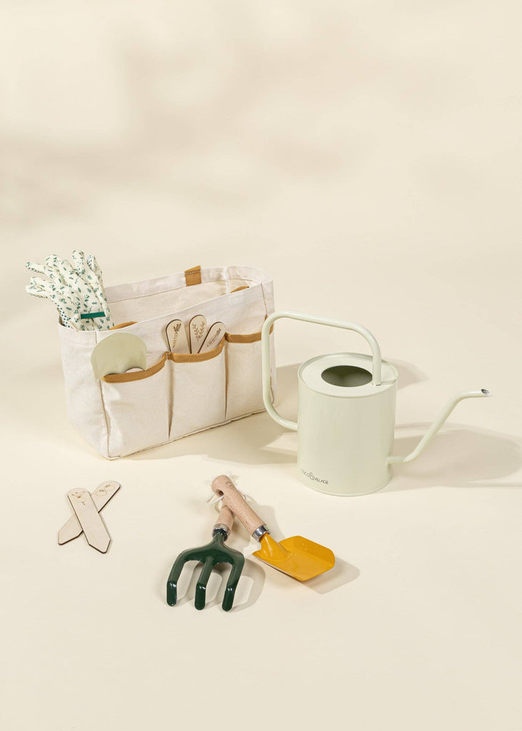 The Gardening Tools Playset includes a canvas bag with handles, gloves, trowel, fork, watering can, plant markers, and a yellow rake—everything young gardeners need for educational outdoor fun.