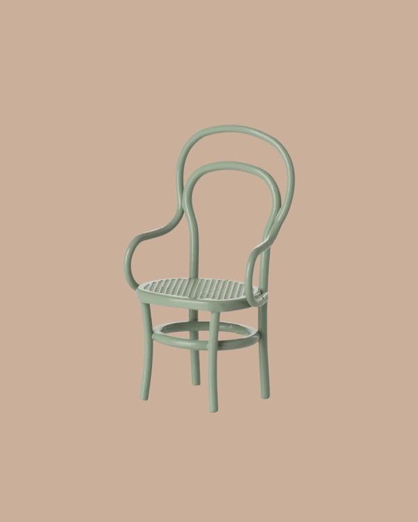 The PRE-ORDER: Vintage Chair, Mouse Size - Mint features a light green bentwood design with curved metal armrests and a rounded back, shown against a solid peach background. Estimated ship date: late September.