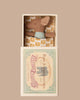 The PRE-ORDER: Sleepy Wakey Baby Mouse in Matchbox - Blue (ships late October) features a small brown mouse in a blue polka-dot shirt, resting on a patterned blanket inside a vintage-style matchbox bed with an elephant illustration.