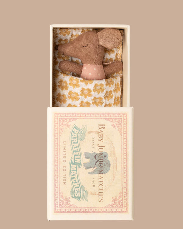 The PRE-ORDER Sleepy Wakey Baby Mouse in Matchbox - Rose features a small mouse in a pink polka-dot outfit, tucked in soft bedding inside a vintage-style matchbox. Estimated ship date: late October.