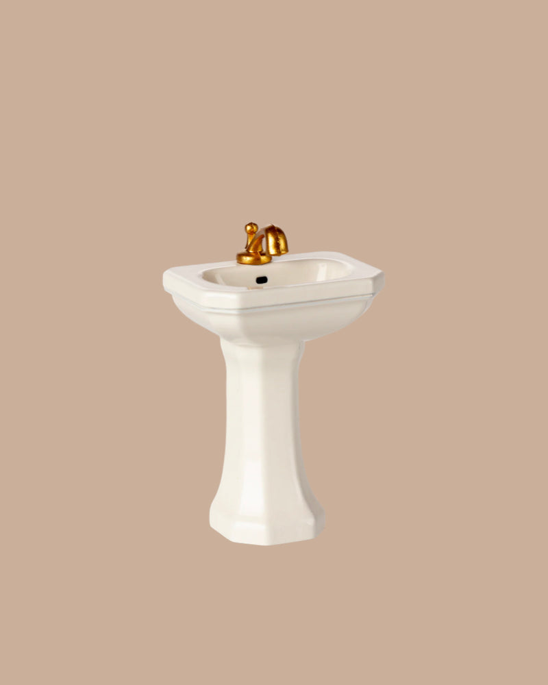 The PRE-ORDER: Bathroom Sink, Mouse Size - Off White (ships early October) features a gold faucet and classic style, ideal for tiny mouse bathrooms from SuitCasa.