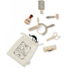 A collection of children's Pretend Play Wooden Barber Set beauty accessories, including a brush, mirror, lipstick, perfume bottle, scissors, hairdryer, and comb, all arranged neatly beside a drawstring bag.