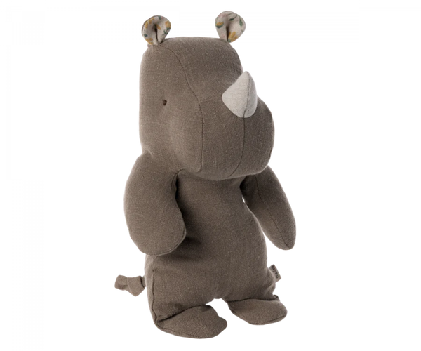 Gray Small Maileg Rhino plush toy standing upright with a visible white horn and small ears, crafted from the softest fabric, isolated on a black background.