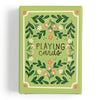 The Green Floral Deck of Playing Cards, shipping in about one week, features a green box with floral patterns and "Playing cards" in artistic lettering—a hand-illustrated design ideal for game enthusiasts.