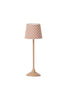 The Maileg Nursery Set includes a charming beige table lamp with a round base and tall, slender stand. Perfect for cozy spaces, its lampshade has small brown polka dots on a white background, making it an ideal addition to any room loved by Maileg fans or mouse families in doll houses.