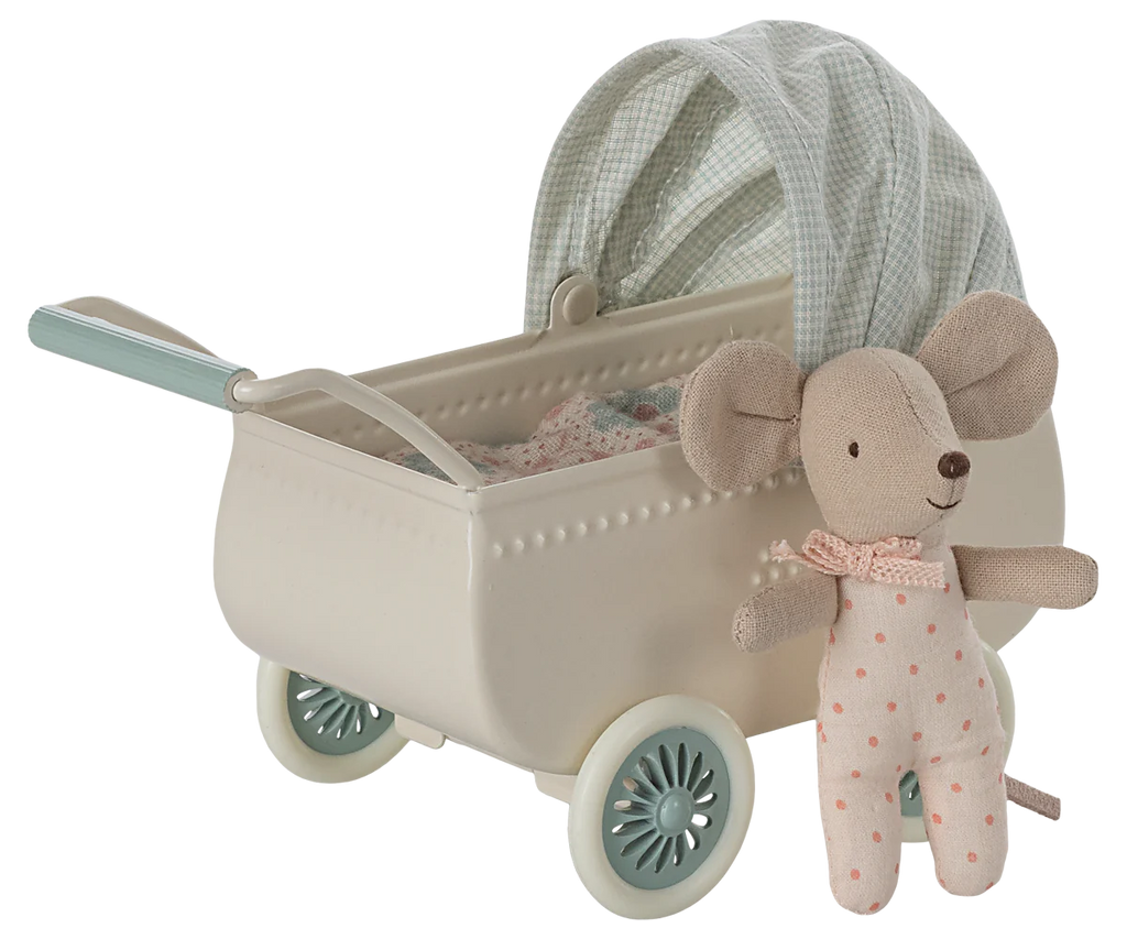 The Maileg Pram With Baby Mouse - Mint features a small toy mouse in a pink polka dot outfit and sleeping bag beside a cream pram with blue wheels and a green-checked canopy, creating a charming vintage look.