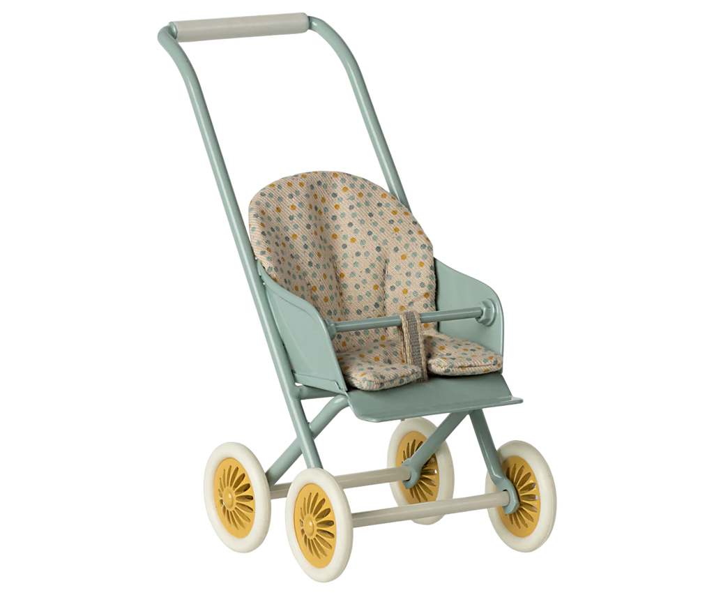 The Maileg Stroller, Micro – Mint features a light blue frame, patterned fabric seat, yellow wheels, and is designed for children to push dolls or stuffed animals.