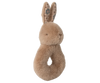 The Maileg Bunny Rattle Set - Cream Peach is a soft, plush beige ring-shaped rattle made of cotton. It features long ears with a floral inner pattern and stitched eyes and nose. Ideal for infants and toddlers, it comes in an elegant gift box.