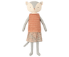 A fabric cat doll with a cream face and grey body wearing a red and white striped shirt and a floral skirt. This cuddly toy has simple stitched features and stands upright in the image, ready to be your Maileg Best Friend - Cat. Perfect for snuggling or as a charming addition to any gift box.