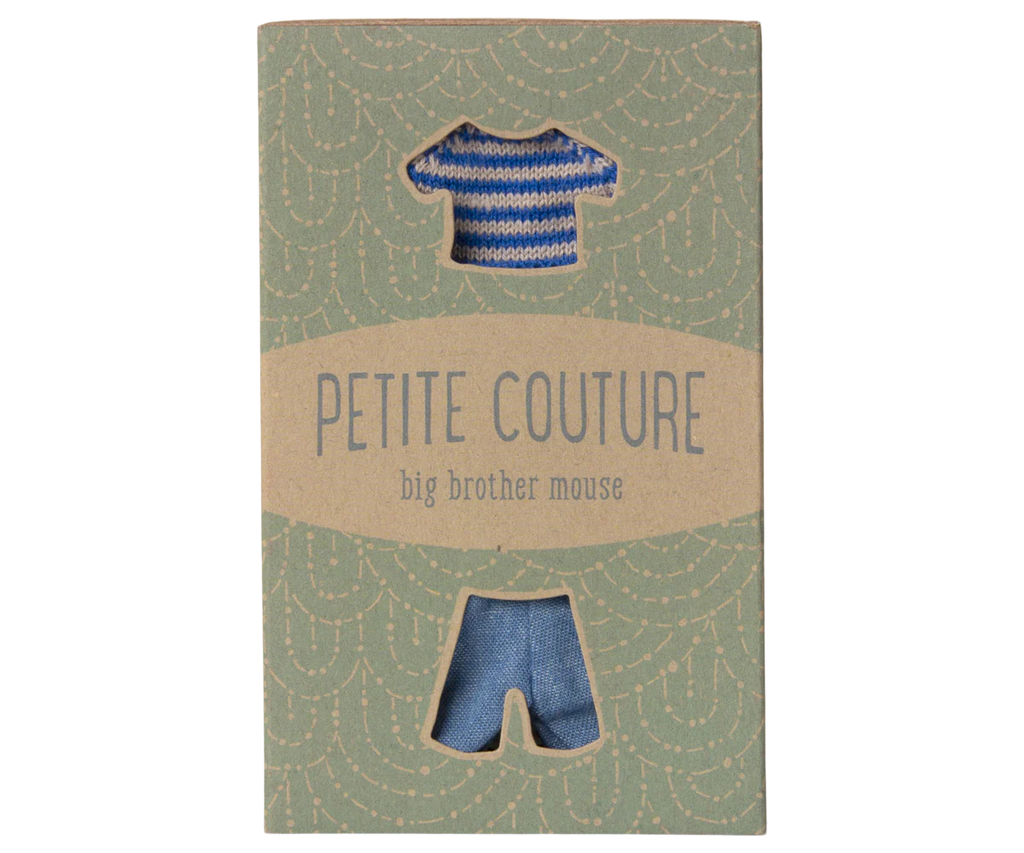 A green package with a shirt and pants cutout reveals blue striped cotton clothing. The text reads "Maileg Knitted Sweater And Pants For Big Brother Mouse," set against a pattern of white arches. Ships in one week.