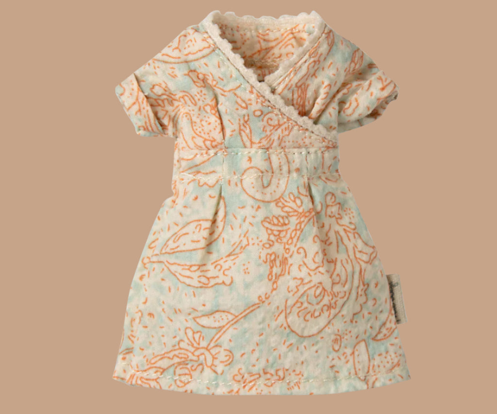 The Maileg Mom Mouse With Extra Outfit - Petite Couture showcases a delightful wrap-over dress with short sleeves, lace trim, and an orange floral pattern on light teal, perfect for dressing Maileg Mum Mouse in charming elegance against a beige background.