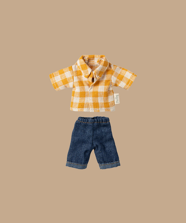 A beige backdrop highlights Maileg's Yellow Checked Shirt and Dark Blue Pants for Dad Mouse, featuring a charming pattern and a small side tag. Ships in one week.