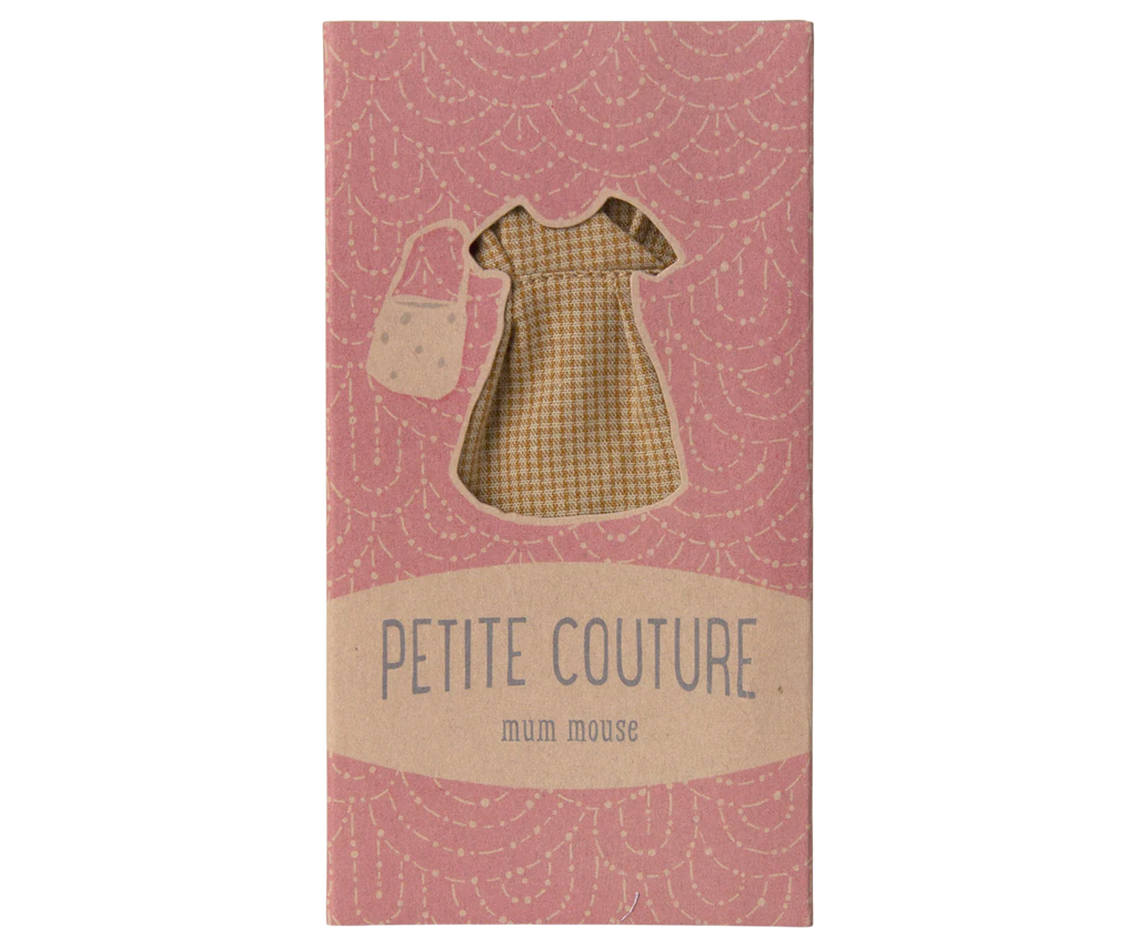 A pink box with scalloped patterns has a cut-out window displaying a small check dress and cheese hole bag. The text reads, "Petite Couture, mum mouse." Product: Maileg Dress And Bag For Mum Mouse (ships in one week).