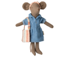 The Maileg Denim Dress And Bag For Mum Mouse is a charming stuffed toy mouse in a blue denim dress set with a plaid headband and striped tote bag, made from soft cotton material and elegantly posed against a plain background.