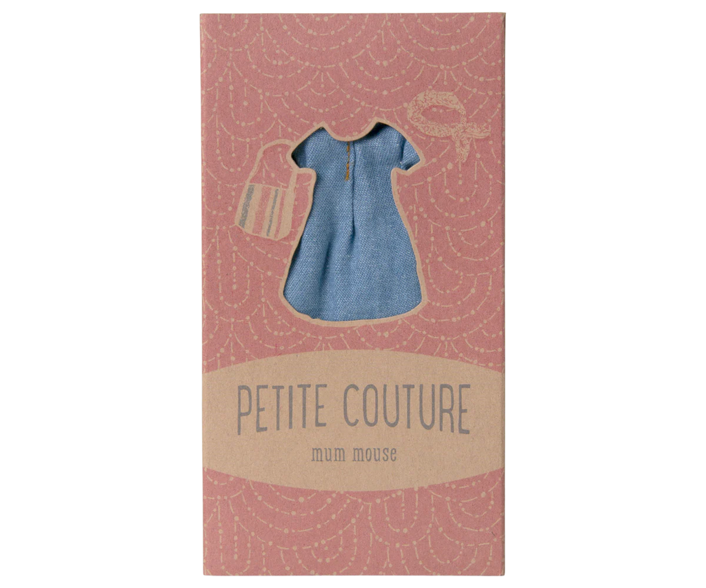 A packaged set for a mum mouse features a blue denim cotton doll dress with charming illustrations of a handbag and hat on its pink packaging. It is labeled "Maileg Denim Dress And Bag For Mum Mouse.