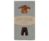 The "Maileg Shirt And Striped Pants For Dad Mouse" package features cute mouse attire, including a tiny brown dotted shirt and dark striped pants, against a charming patterned blue background. Ships in one week.