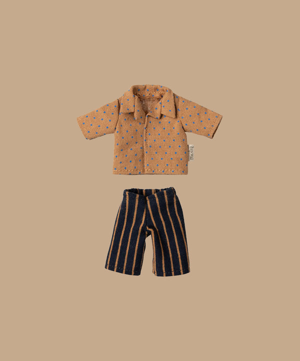 The Maileg Shirt and Striped Pants for Dad Mouse features a light brown dotted shirt with a subtle pattern and dark blue pants with thin vertical orange stripes on a beige background. Ships in one week.