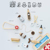 A flat lay of the Pretend Play Animal Vet Set, featuring a stethoscope, thermometer, scissors, and more. Icons above highlight skills gained through veterinarian-inspired role play.