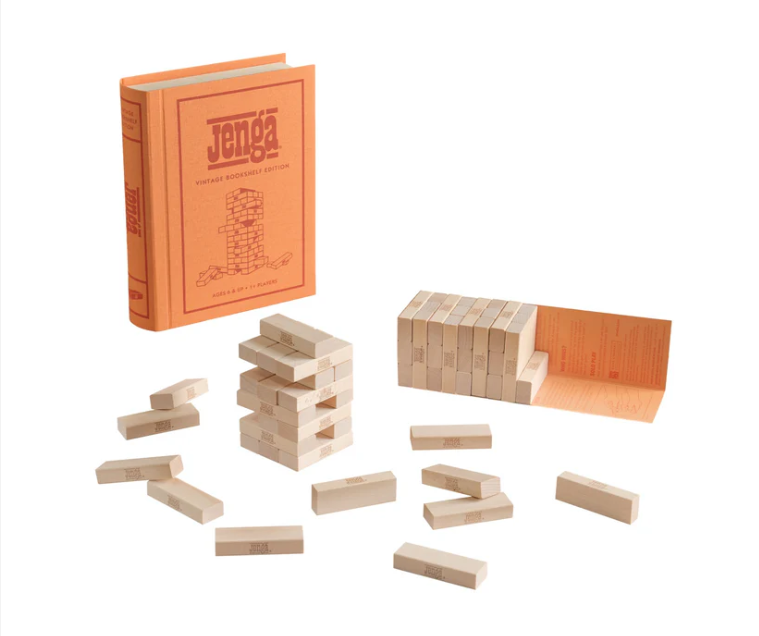 The Jenga Vintage Bookshelf Edition features wooden blocks in a stylish, book-shaped case—open or closed—making it a perfect choice for family game night.