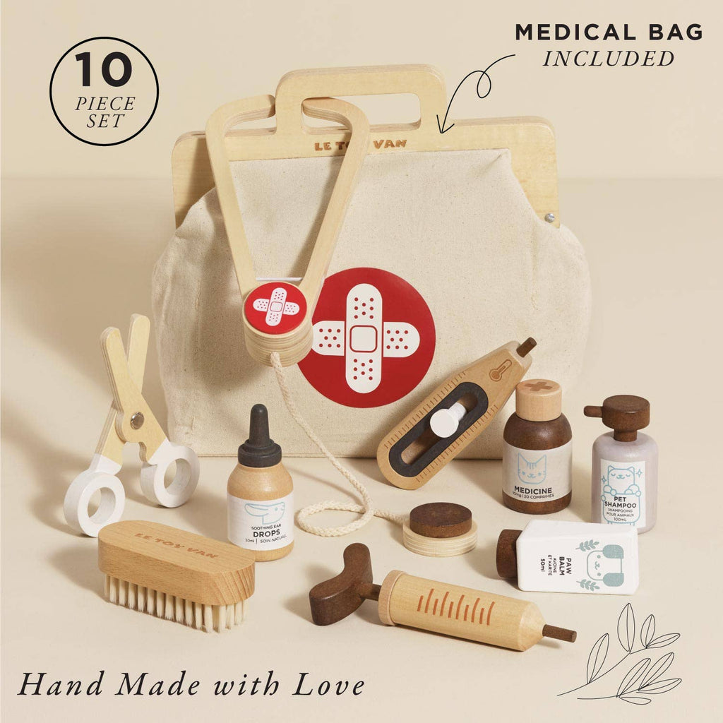 The Pretend Play Animal Vet Set is a 10-piece, hand-made wooden set with a medical bag included—featuring a stethoscope, scissors, syringe, bottles, thermometer & more. Perfect for career-based role play!.