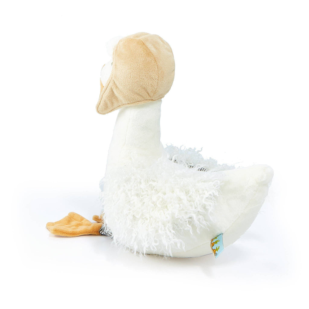 Meet Avery the Aviator Snow Goose Stuffed Animal, featuring soft white fur with light brown accents on its head and tail. The plush toy sits upright, shown from a side angle, highlighting its orange webbed feet.