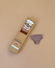 The Minikane kraft box contains the "Little Hearts" Panties Weekly set for dolls, featuring hand-washable fabric underwear in beige, pink, brown, and mauve. Perfectly designed for Minikane Gordis dolls and made in France, one mauve pair is displayed beside the box on a neutral beige background.