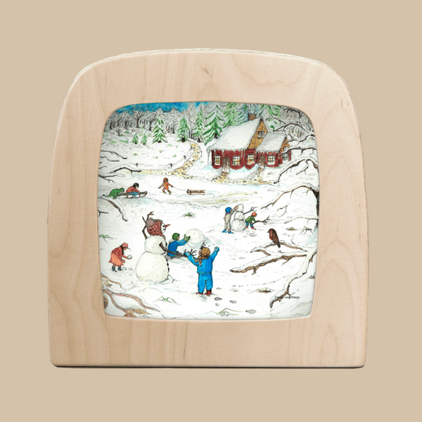The "Silhouette Only - Red Cottage: Winter for Toverlux Lamp" features children playing, building snowmen, and sledding near a red cottage among snowy trees under a blue sky, ideal for creating a cozy winter scene with your lamp.