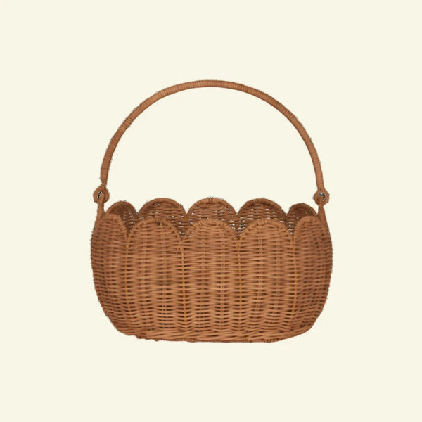 The Olli Ella Scalloped Petal Basket - Natural is a wicker handbag with a scalloped design and curved handle, ideal for chic storage.