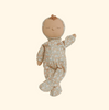 The Olli Ella Dozy Dinkums - Custard - Garden Floral doll, dressed in a charming floral print onesie with a hood, features closed eyes, a tuft of hair, and a gentle smile. It's the perfect peaceful companion for Easter, resting against a neutral background.