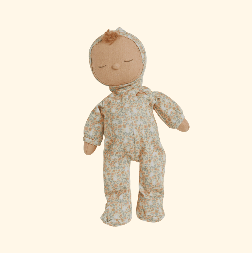 Introducing the Olli Ella Dozy Dinkums - Custard - Garden Floral, a soft doll in a charming floral onesie with a hood. It's an ideal Easter companion, featuring a simple face with closed eyes and soft brown hair. Its arms and legs are slightly spread apart for endless cuddles.