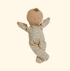 Introducing the Olli Ella Dozy Dinkums - Custard - Garden Floral: a fabric doll with a serene expression, ideal for Easter. This charming doll wears a garden floral hooded onesie, with gently outstretched arms and crossed legs against a simple, light backdrop.