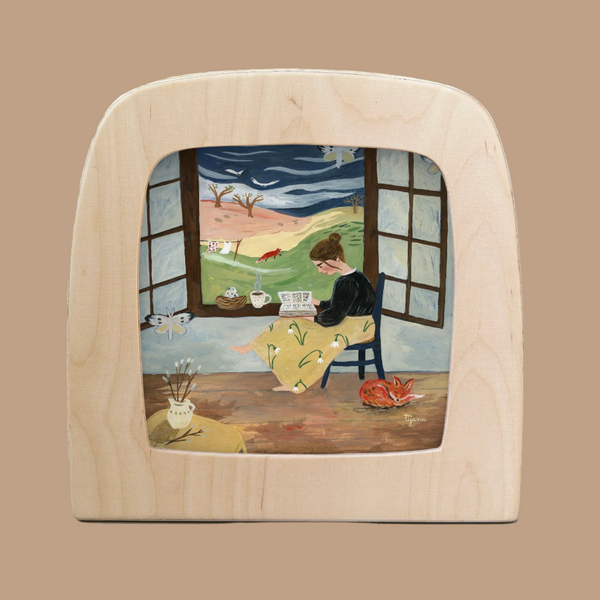 A person in a wooden frame reads a newspaper by an open window, overlooking a hilly landscape with trees and paths. A nearby cat slumbers amid butterflies on the frame. Painted in warm, earthy tones, this scene captures nature's magic as part of the Silhouette Only - Beginning of Spring for Toverlux Lamp.