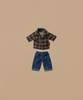 The Maileg Dad Mouse - Light Brown set features a miniature checked shirt with a collar and blue denim pants, set against a beige backdrop, echoing dad mouse fashion. Ships in one week.
