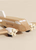 The Wooden Toy Plane is made from FSC-certified wood, painted light brown and white with windows, wings, and twin front propellers. "Le Toy Van Airlines" is printed on the side. This toy is charming and plastic-free.