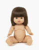 A Minikane Baby Doll with sleeping eyes, named Chloe, is seated upright against a plain white background. The 13" doll features lifelike detail and anatomically correct design, with arms slightly extended and fingers open. Clothing for the doll is sold separately.