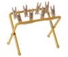 A yellow Maileg Drying Rack, Mouse Size is displayed with multiple small wooden pegs attached along the top bar. The pegs are evenly spaced and ready for use, while the rack stands on four rounded legs.