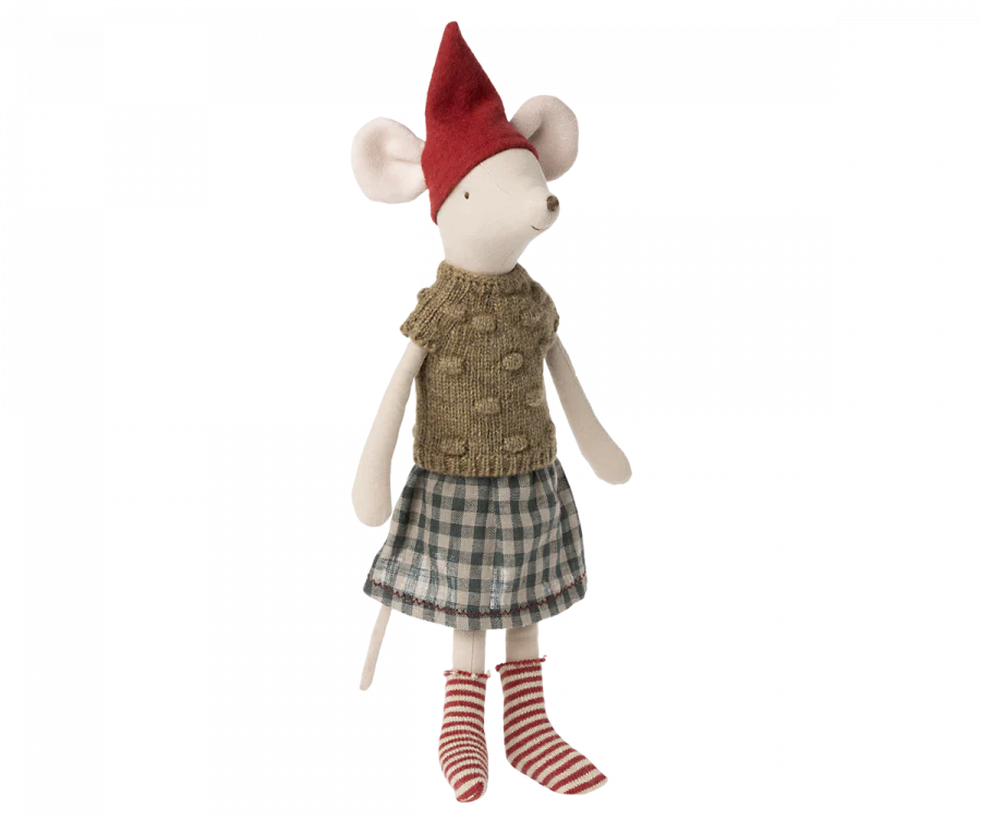 Introducing the Maileg Medium Christmas Mouse, a holiday charm in cozy attire. This delightful mouse is dressed in a knitted brown sweater, a plaid skirt, and festive red-and-white striped socks. It also sports a red pointed hat and stands upright, ready to bring Christmas cheer to any setting.