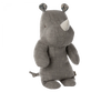 A Small Maileg Rhino plush toy, one of the softest fabric safari friends, stands isolated against a black background, crafted from grey textured fabric with stitched eyes and a small white horn.