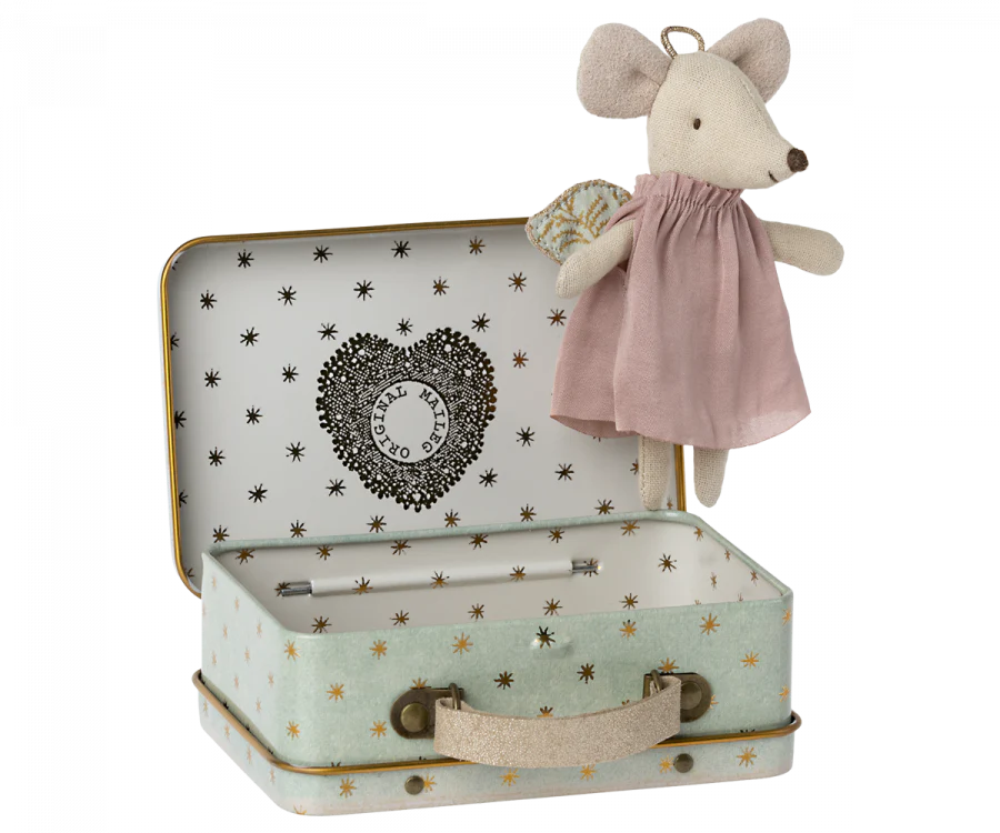 A Maileg Angel Mouse in Metal Suitcase dressed in a pink dress sits on the edge of an open, mint-coloured suitcase adorned with star patterns. The inside of the suitcase features the text "Maileg" within a heart-shaped design.