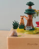 A colorful Florida Wooden Music Box featuring a Florida national park theme, with a sculpted cat, bird, manatee, and tree on a labeled base.