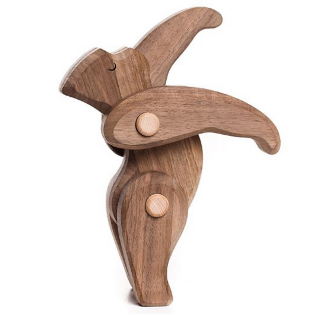 Handmade wooden gorilla toy standing upright with visible joint pegs at the limbs and neck. The gorilla's ears are tilted back, showcasing non-toxic paints on its smooth, polished finish.