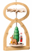 The Richard Glaesser Mini Pyramid Hanging Ornament - Santa, made in Germany, features a top fan. Inside, it showcases a green tree, reindeer, small presents, and carved stars. Made from natural wood, it's designed to spin gently and bring holiday cheer.